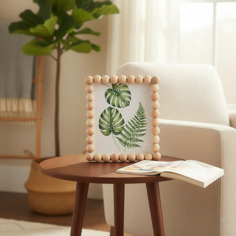Picture frame decorated with split wooden balls
