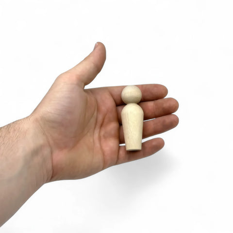 Close-up of 69 mm wooden peg doll showing wood grain