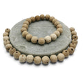 White oak beads in bracelet on the stone decoration and white oak beads loose around